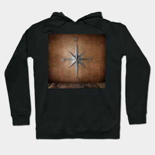 Metal Decorative Compass on a Distressed Background Hoodie